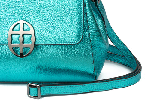 Metallic Turquoise Teal leather handbag with a silver clasp buckle on a white background. - DEI DUCHI (AMALTEA)