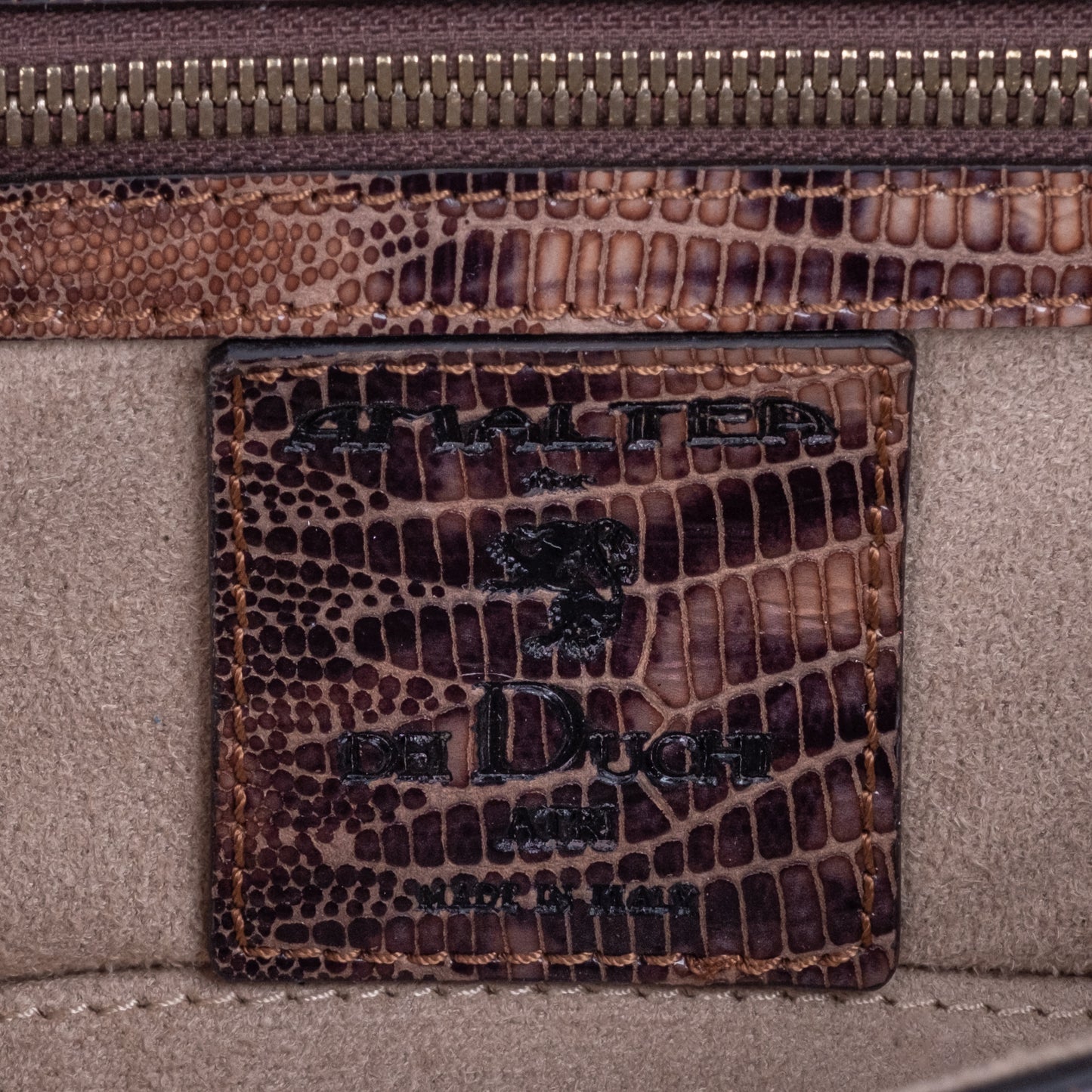 Brown embossed leather python skin clutch bag with gold chain and buckle/emblem on a white background. - DEI DUCHI (AMALTEA)