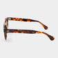 Sunglasses with tortoiseshell frame and green lenses on a white background. - DEI DUCHI
