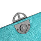Close-up of a textured Metallic Turquoise Teal leather handbag with a burnished metal clasp buckle on a white background. - DEI DUCHI (AMALTEA)