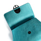 Metallic Turquoise Teal leather handbag with a silver clasp buckle on a white background. - DEI DUCHI (AMALTEA)