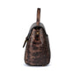 Brown leather textured handbag with a gold clasp on a white background. DEI DUCHI (AMALTEA)