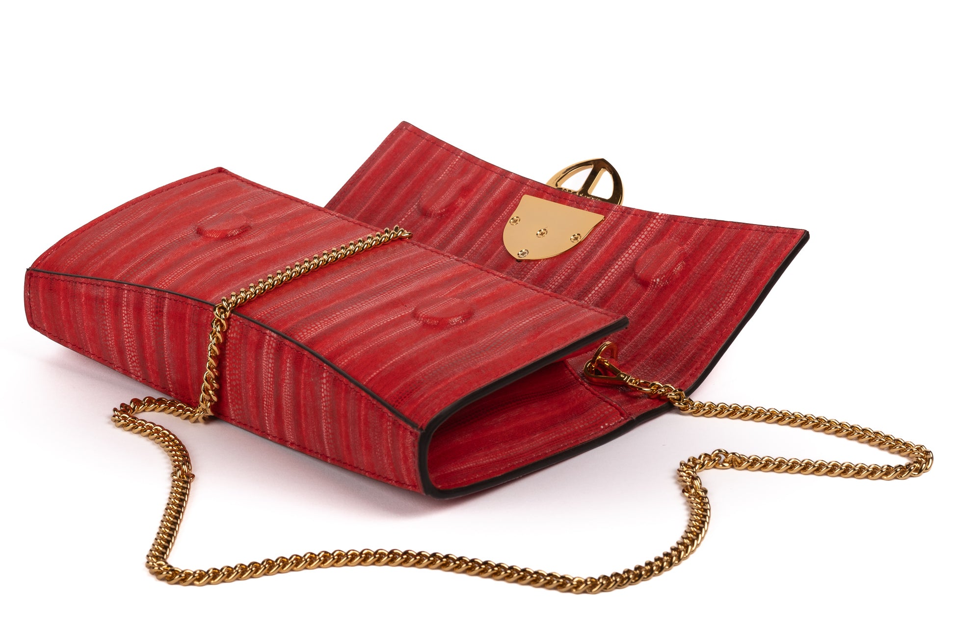 Laid view of Red handbag with a chain detail strap, Red clutch bag with a gold emblem/buckle on a white background - DEI DUCHI (ALMATEA)