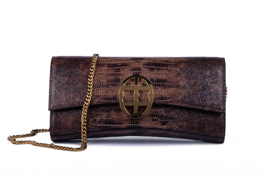 Brown embossed python skin clutch bag with gold chain and buckle/emblem on a white background. - DEI DUCHI (AMALTEA)