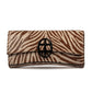 Zebra embossed pinkish leather clutch bag/wallet with a burnished metallic emblem buckle on a white background. - DEI DUCHI (AMALTEA)