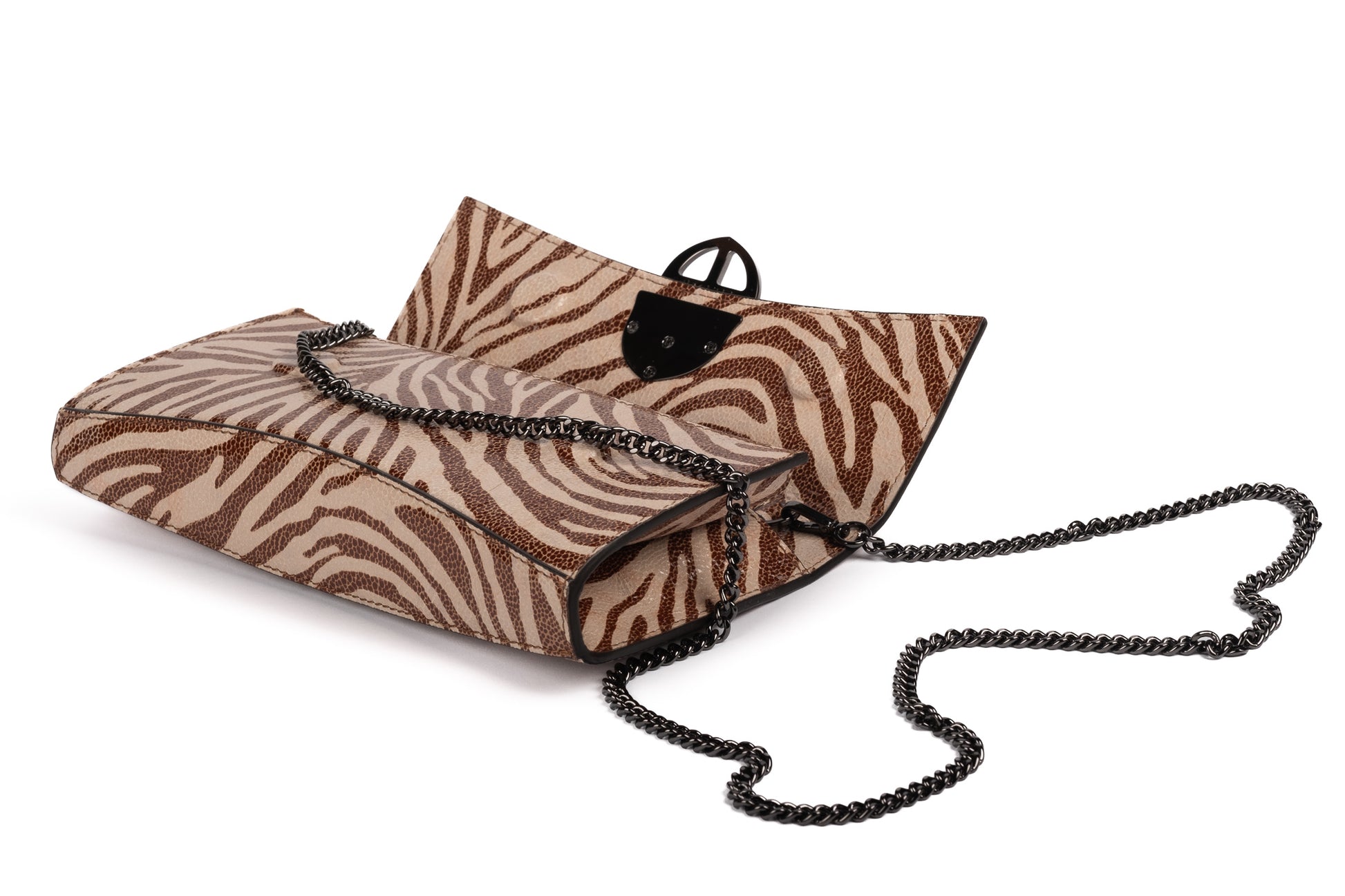 Zebra embossed pinkish leather clutch bag/wallet with a burnished metallic emblem buckle on a white background. - DEI DUCHI (AMALTEA)