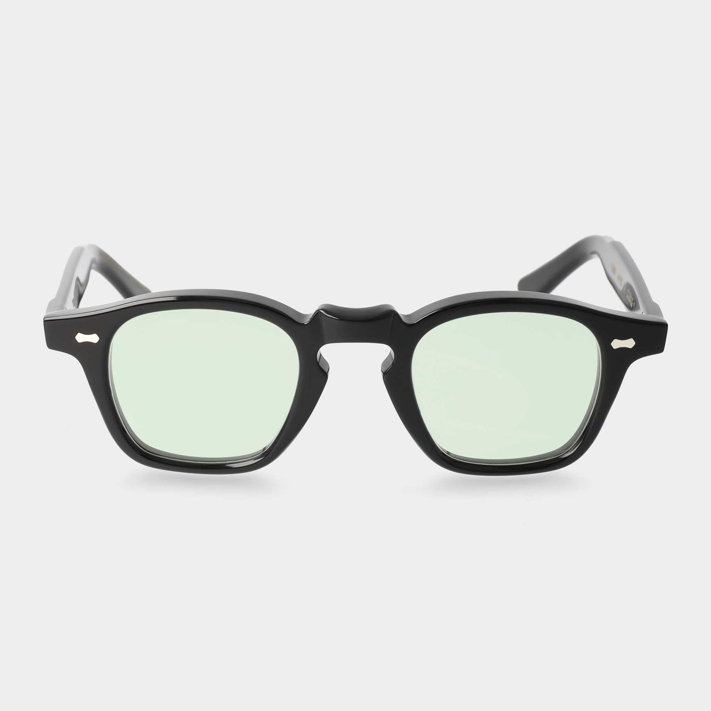 Black-framed sunglasses with light green lenses on a white background - Dei Duchi