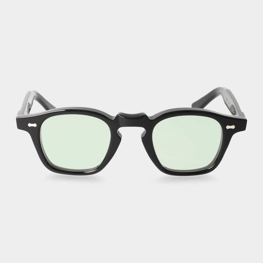 Black-framed sunglasses with light green lenses on a white background - Dei Duchi