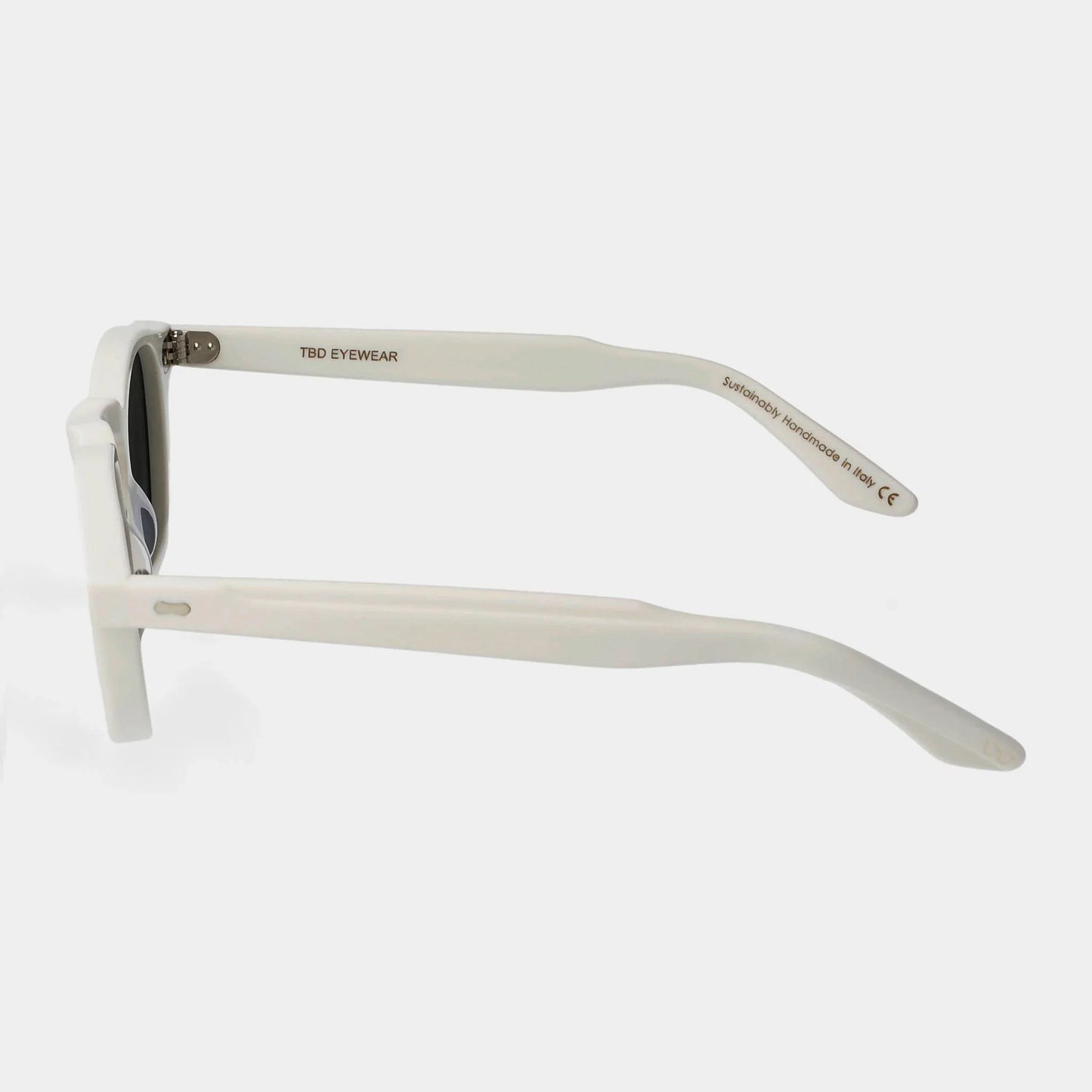 Sunglasses with white frame and dark lenses on a light gray background. - Dei Duchi (TBD Eyewear)