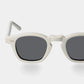 Sunglasses with white frame and dark lenses on a light gray background. - Dei Duchi (TBD Eyewear)