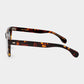 Sunglasses with tortoiseshell frame and orange lenses on a light gray background. - DEI DUCHI