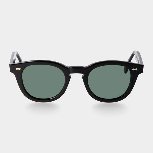 Black sunglasses with green lenses on a white background. - DEI DUCHI