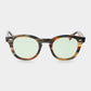 Sunglasses with tortoiseshell frame and green lenses on a white background. - DEI DUCHI