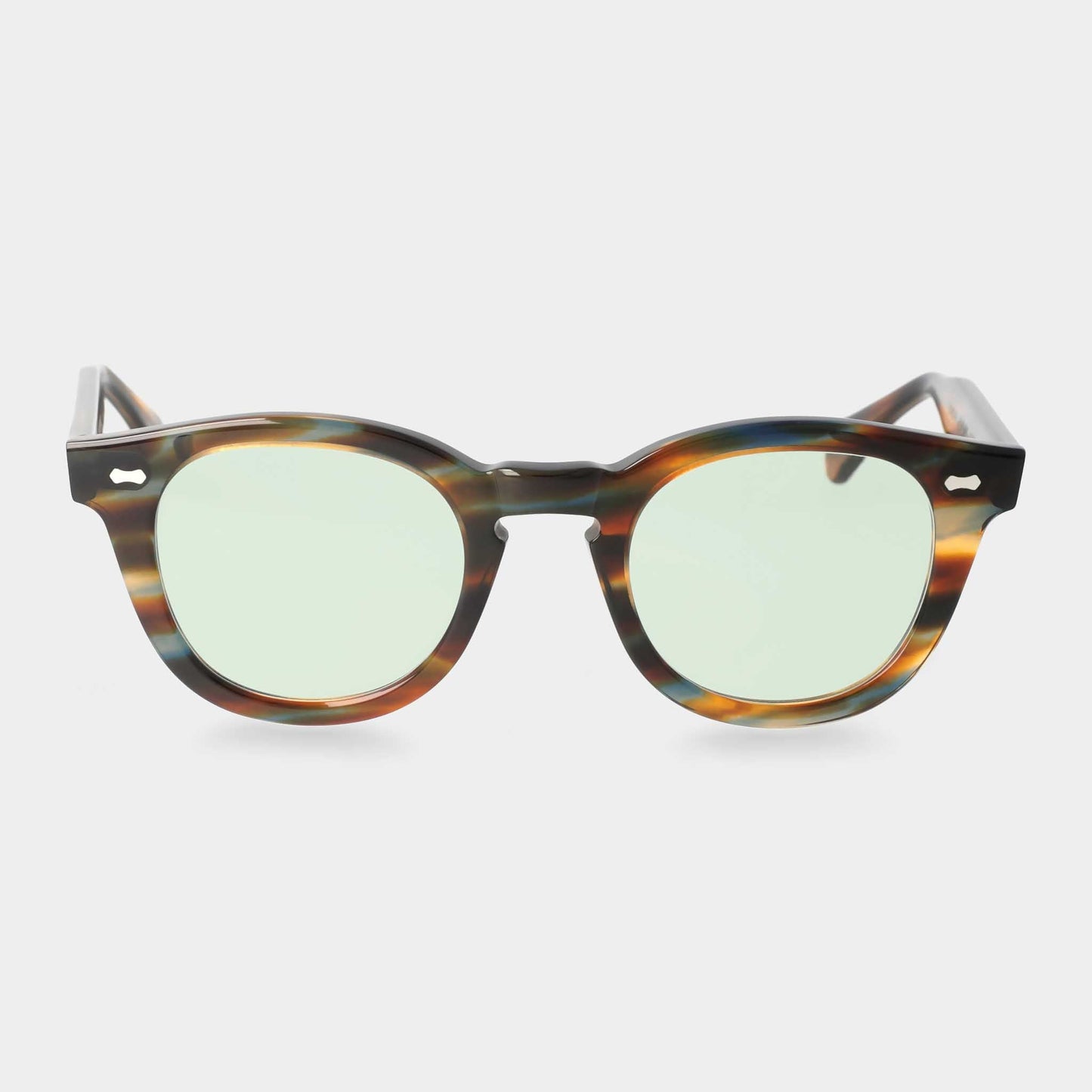 Sunglasses with tortoiseshell frame and green lenses on a white background. - DEI DUCHI