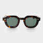 Sunglasses with tortoiseshell frame and dark lenses on a white background. - Dei Duchi