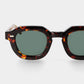 Sunglasses with tortoiseshell frame and dark lenses on a white background. - Dei Duchi