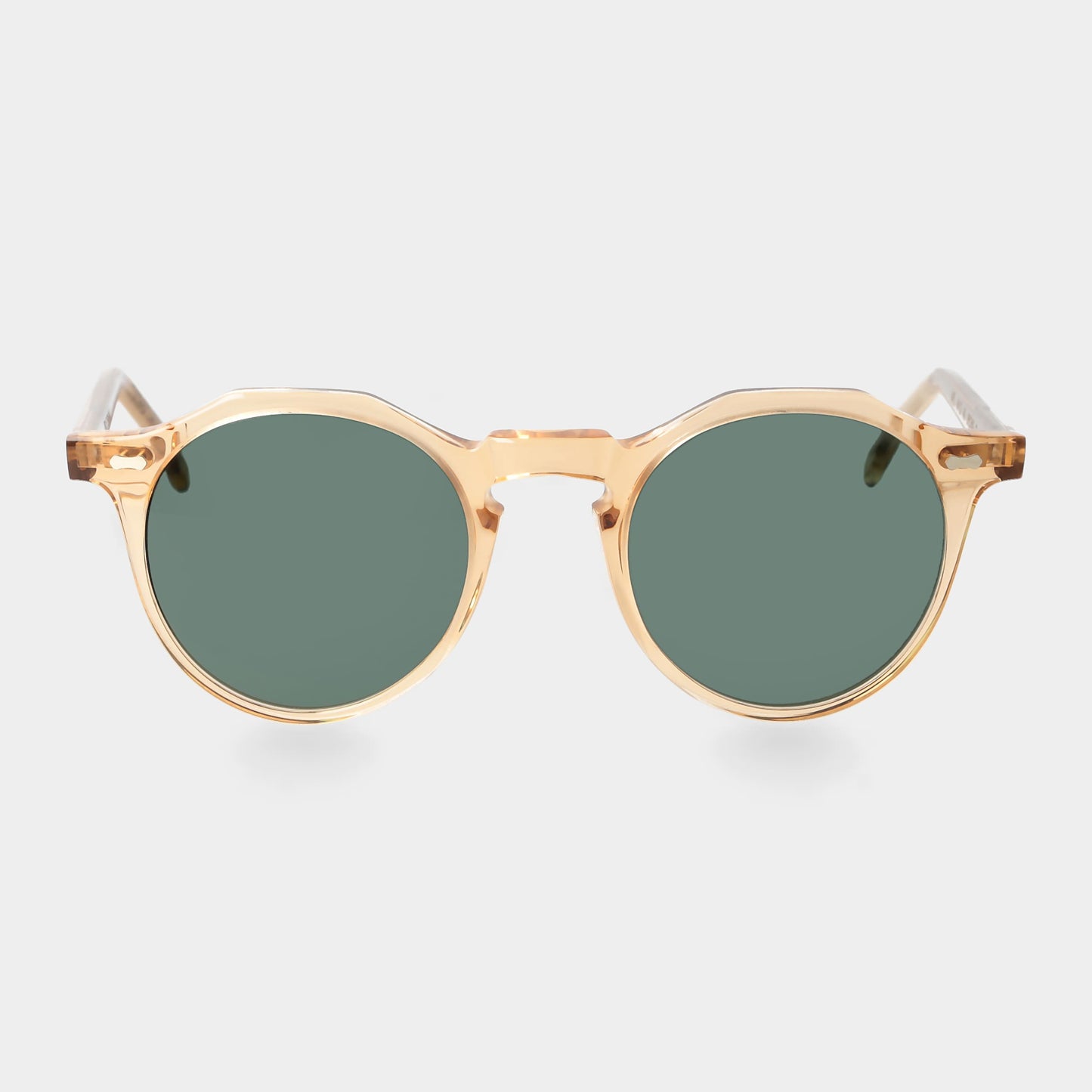 Gold-framed sunglasses with green lenses on a light gray background. - DEI DUCHI