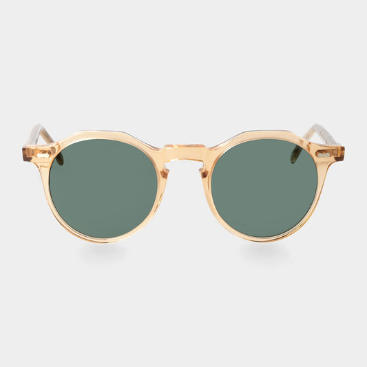 Gold-framed sunglasses with green lenses on a light gray background. - DEI DUCHI