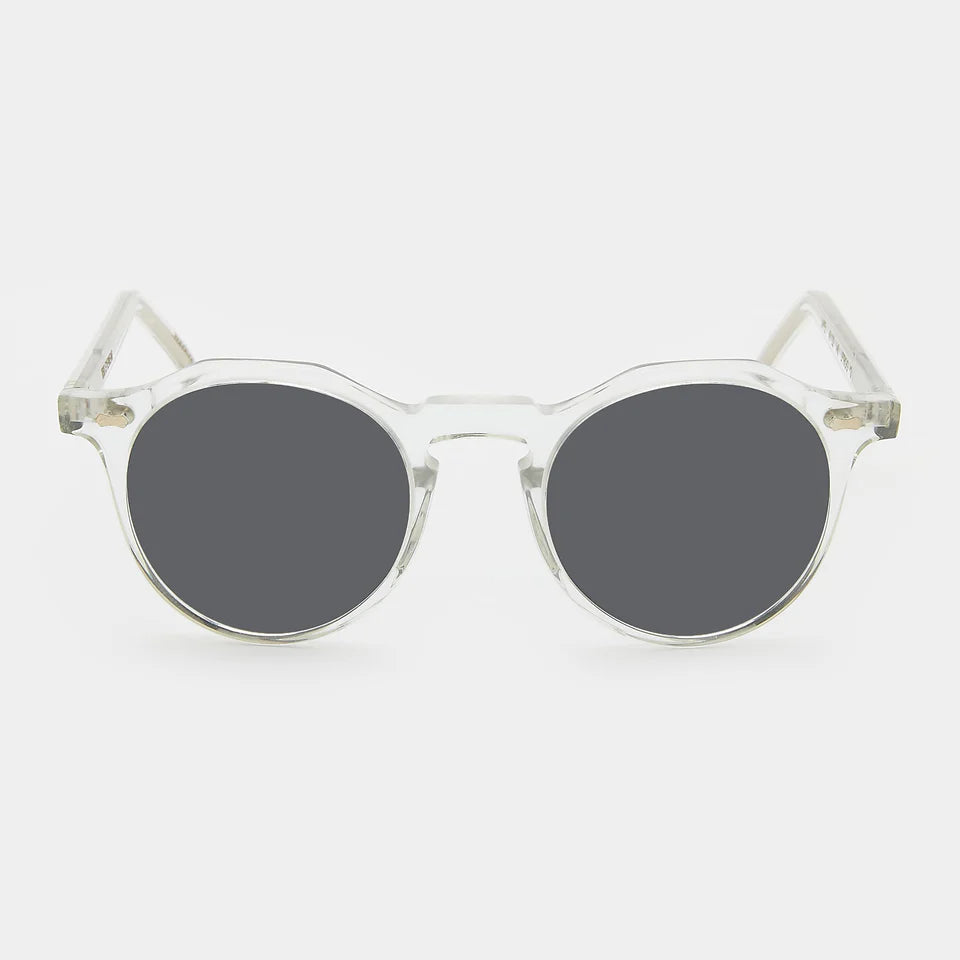 Round sunglasses with clear frame and grey lenses on a white background. - DEI DUCHI