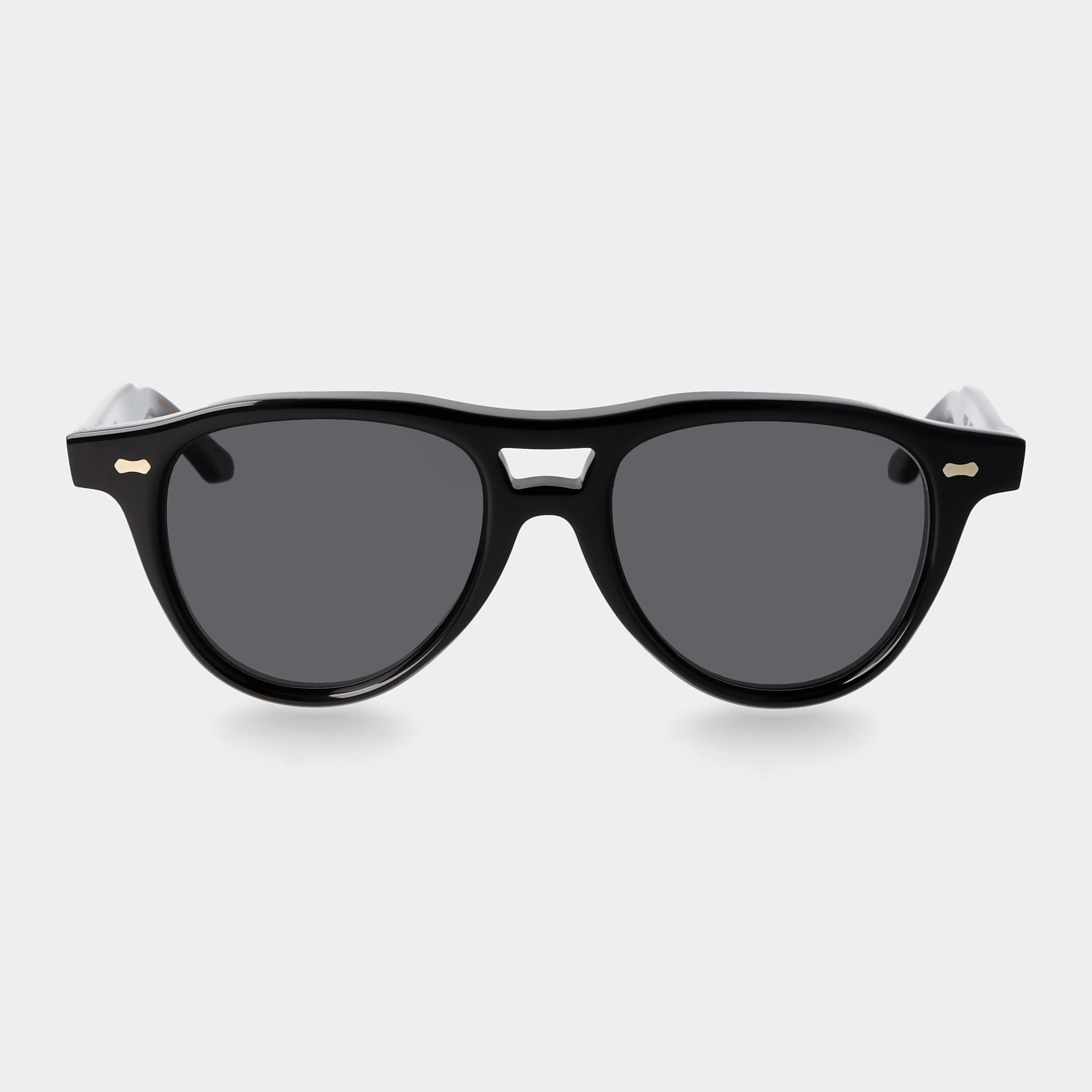 Black sunglasses with dark lenses on a light gray background. - DEI DUCHI