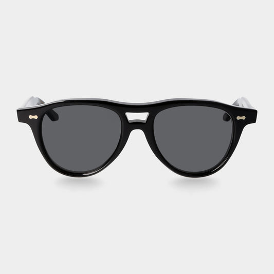 Black sunglasses with dark lenses on a light gray background. - DEI DUCHI