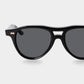 Black sunglasses with dark lenses on a light gray background. - DEI DUCHI
