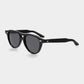 Black sunglasses with dark lenses on a light gray background. - DEI DUCHI
