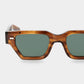 Sunglasses with tortoiseshell frame and green lenses on a white background. - DEI DUCHI