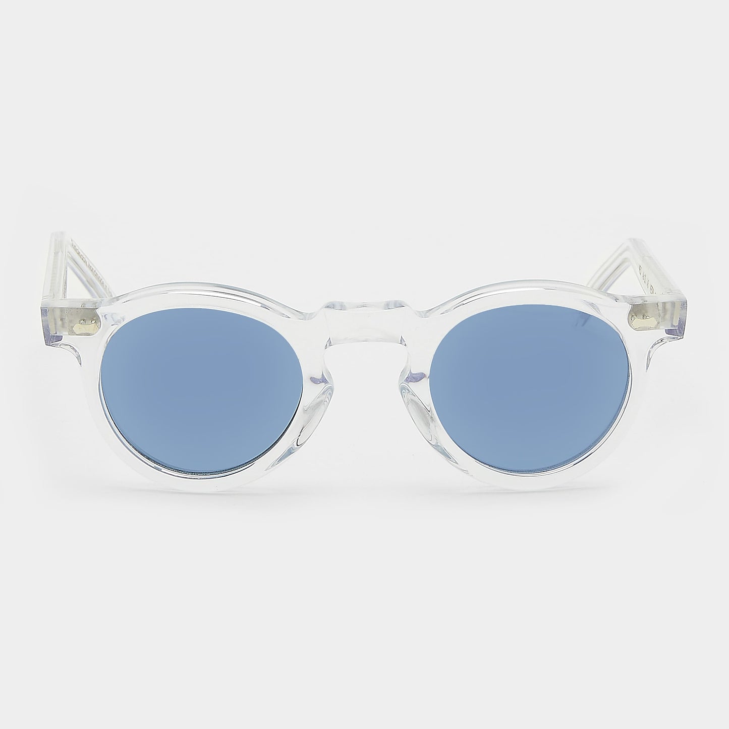Clear frame sunglasses with blue lenses on a white background. - DEI DUCHI